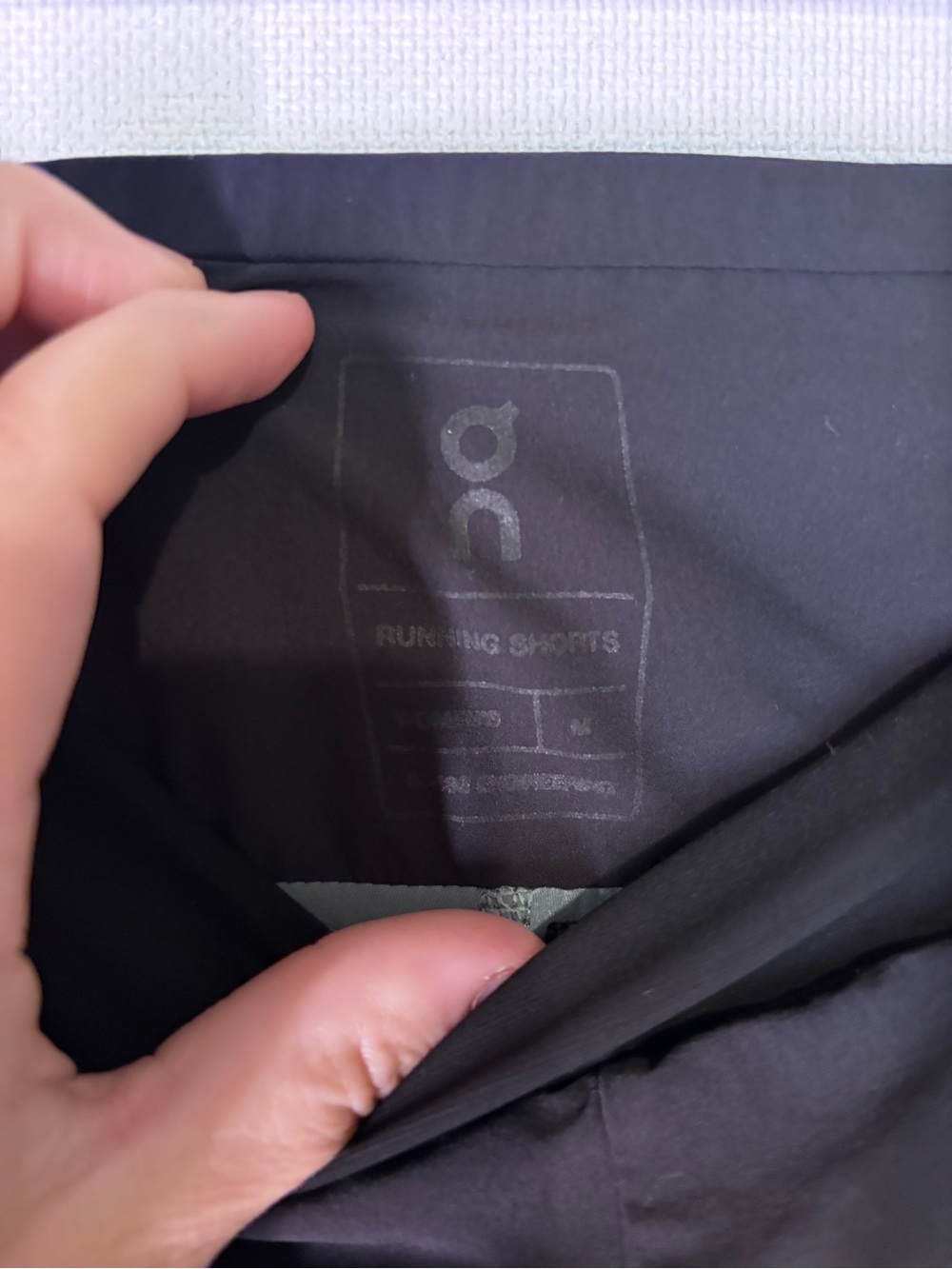 On Running Women's Black Athletic Shorts with Gray Trim - Picture 3 of 4